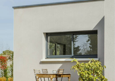 Maison contemporaine toit plat dans l'Ouest Lyonnais