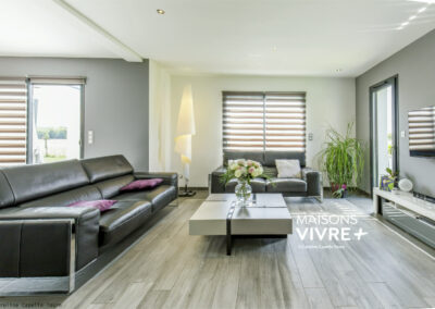 Maison contemporaine en toiture mixte en région Lyonnaise